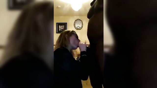 Blonde white hotty with pretty face engulfing big black cock closeup