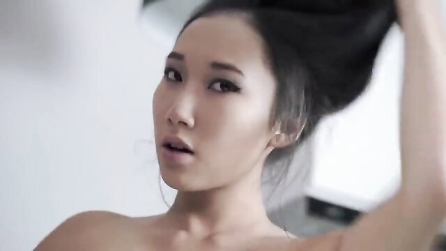 Luna topless Asian beauty with long black hair in seductive pose