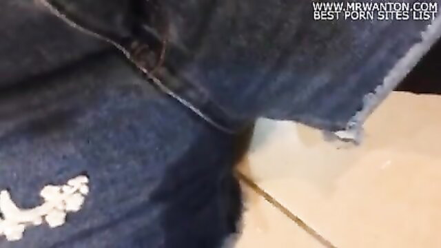 Emma pissing in tight denim shorts, pee soaking crotch and thighs