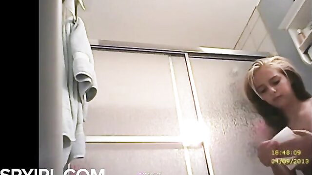 Blonde teen girl nude in shower caught on spy cam, wet body exposed