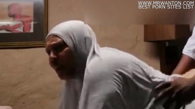 Hot Arab mature in hijab with big tits fucked by black guy