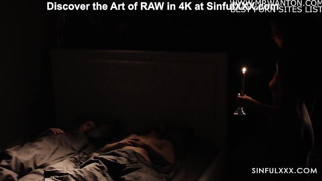 Mystery woman with candle seduces sleeping man in bed, SinfulXXX RAW 4K