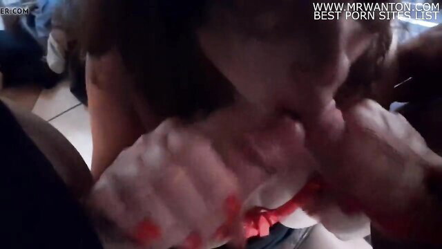 MILF smothering man with huge tits in closeup facefuck