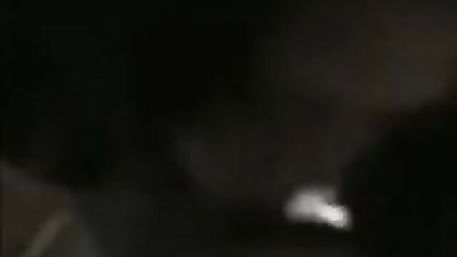 Blurry dark thumbnail of Sri Lankan lady with lover in intimate pose