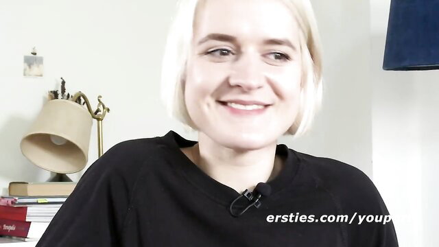 Cute blonde student from Münster smiles in casual black top