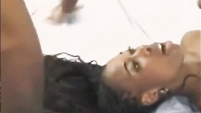 Hot ebony babe with curly hair on back, mouth fucked by big black cock closeup