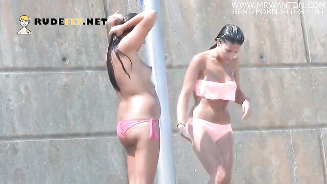 Sunny Day nude beach girl secretly filmed by voyeur, wet pink thong ass