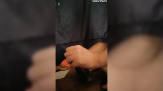 Oily handjob makes him cum on friend's clothes closeup