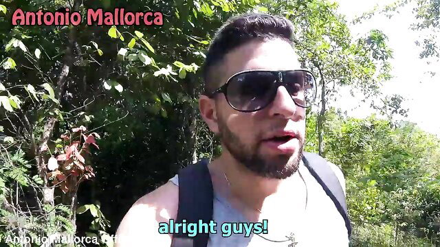 Antonio Mallorca in Mallorca outdoors, shirtless hunk with shades