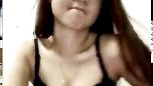 Asian beauty in black lingerie pouting seductively, smooth skin tease