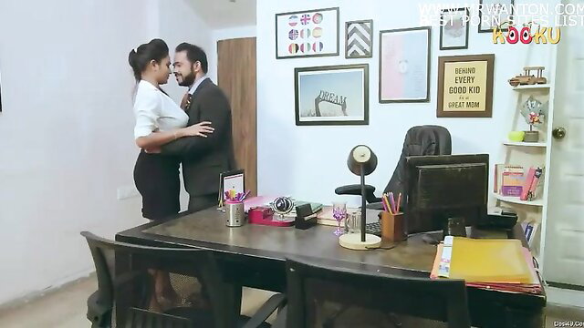 Indian office couple embracing passionately, sexy blouse skirt hug