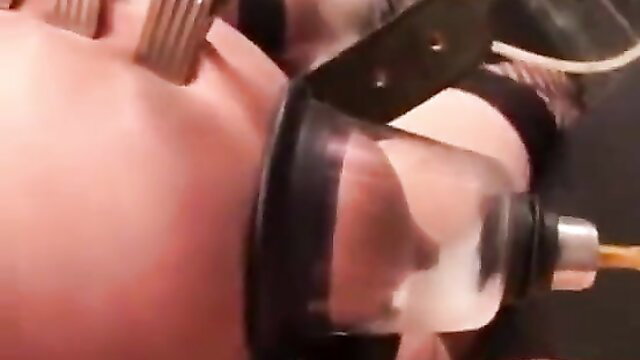 Kinkcore painful milking: bound woman in breast pump vacuum cup