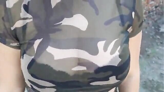 Busty Asian babe in sheer camo top teases nipples for driver's license fuck