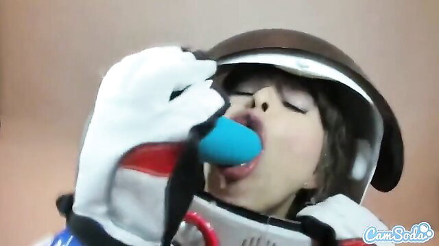 Riley Reid as sexy astronaut sucking blue dildo in helmet