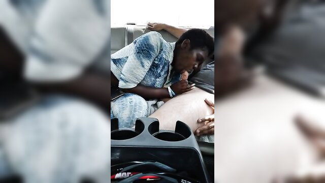 Black beauty in car sucking white cock from title
