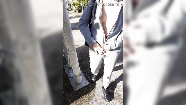 Amateur guy flashing dick outdoors at garden center in open hoodie