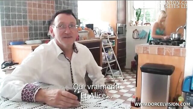 Philippe Soine sips drink with hot blonde Alice in kitchen, Belgique Interdite
