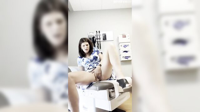 Brunette spreads legs exposing pussy on doctor's exam table
