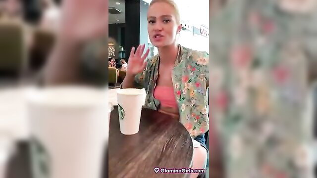 Blonde with bushy pussy in pink bra waves at cafe table quickie tease