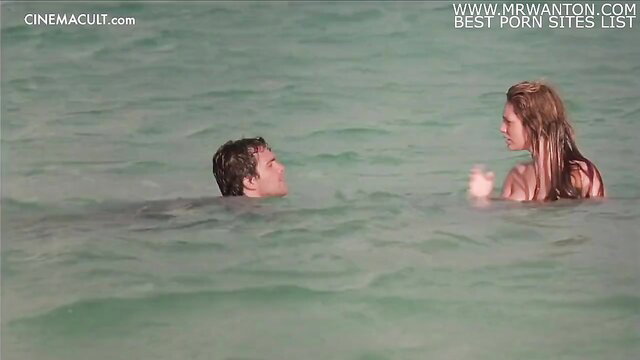 Blonde with big natural tits nude in ocean with man, celeb sex scene