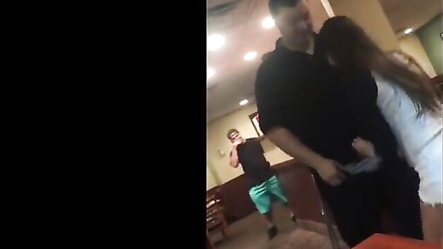 Cutie in white dress kneels giving waiter blowjob tip