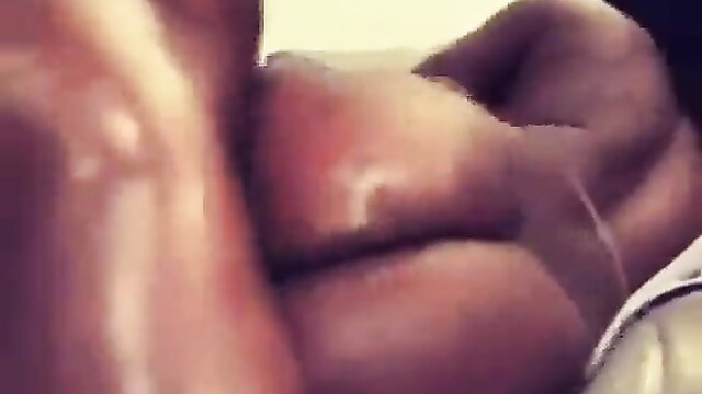 Closeup of Nautica's thick ebony ass and pussy spread on bed