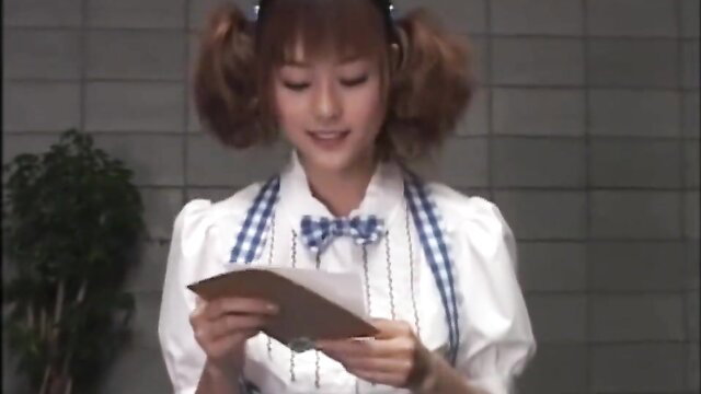 Cute Japanese teen in maid outfit reading letter, bukkake ready