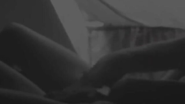 Blurry Dutch amateur couple in dim bedroom intimacy