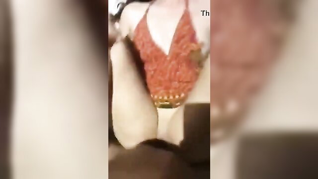 Latina Sonia in skimpy red lingerie top flashing big tits closeup