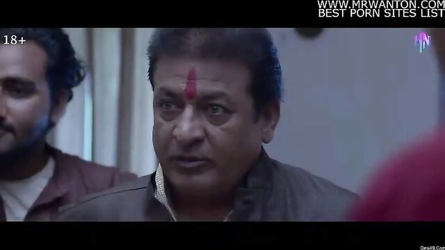 Indian men with tilak in tense discussion, adult Riwaz scene