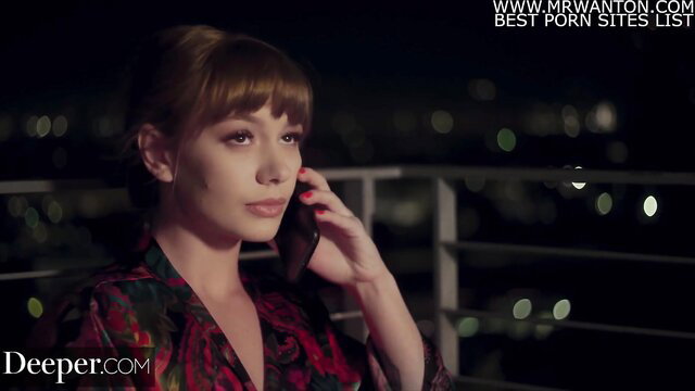 Naomi on phone in sexy dress, intense threesome photoshoot vibe