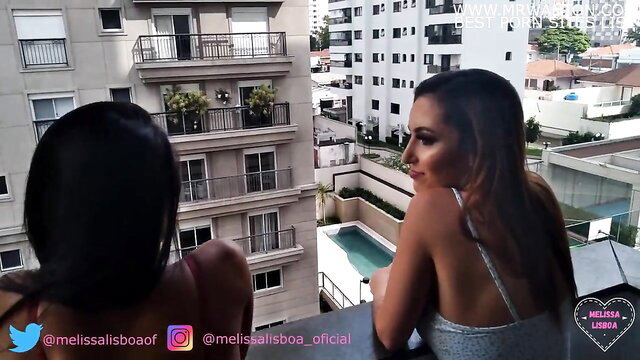 Two busty Brazilian brunettes in lingerie on balcony, hotwife swap vibe