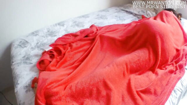 American mom in red towel on bed teases son with dirty talk gift