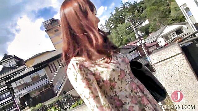 Redhead Asian woman in floral dress at hot springs, outdoor tease