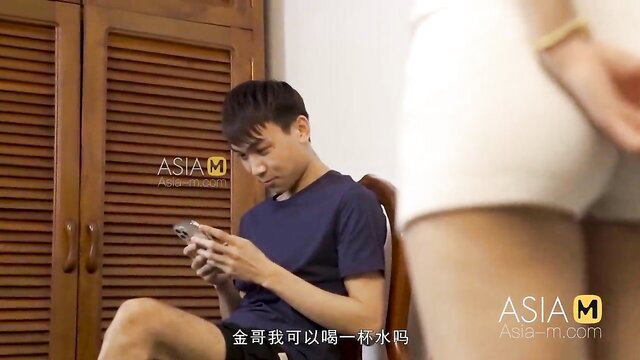 Asian twink in white briefs gets close to seated guy in ModelMedia Asia video
