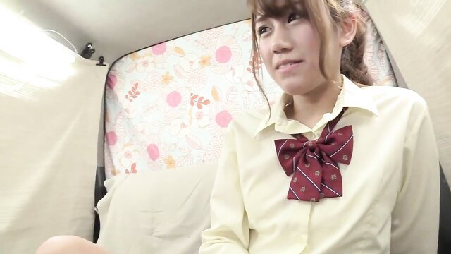 Japanese schoolgirl in uniform on bed, bangs teased by older man
