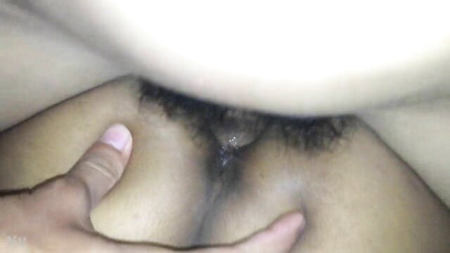 Closeup of wet black pussy spread by hand in horny amateur tease