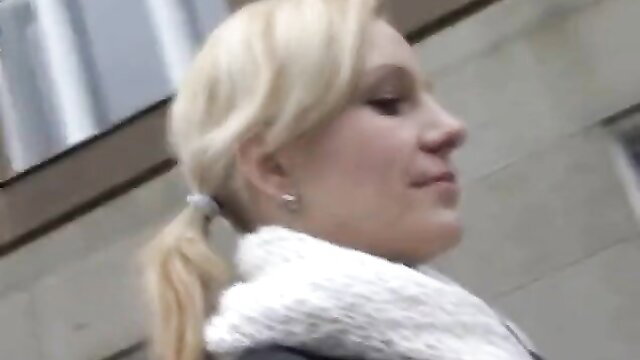 Blonde woman in scarf and ponytail, outdoor upskirt tease