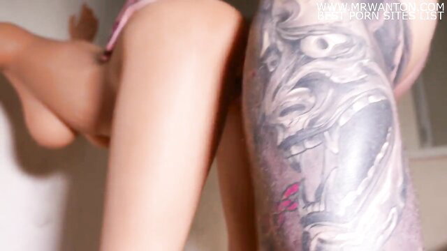 Tattooed Asian babe spreads legs showing pussy and demon thigh tattoo closeup