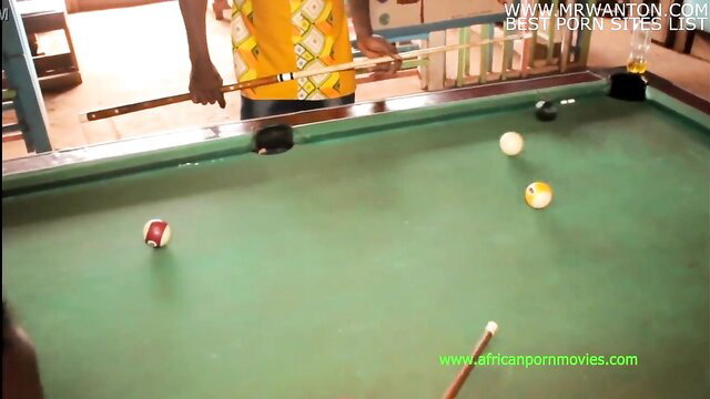 Cameroon billiards sex bet thumbnail: man aims cue at balls on table