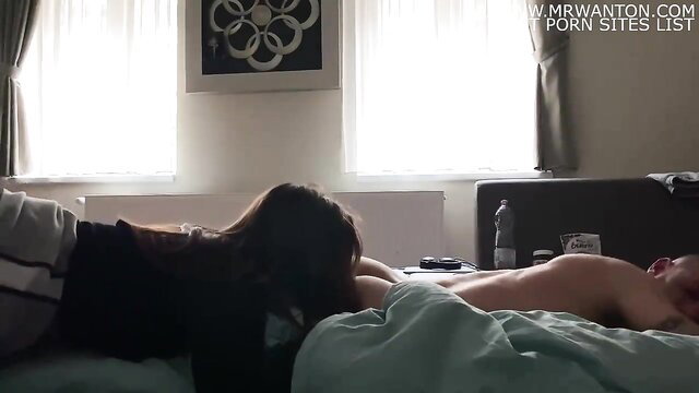 Hot Asian teen teases nude guy in bed amateur threesome preview