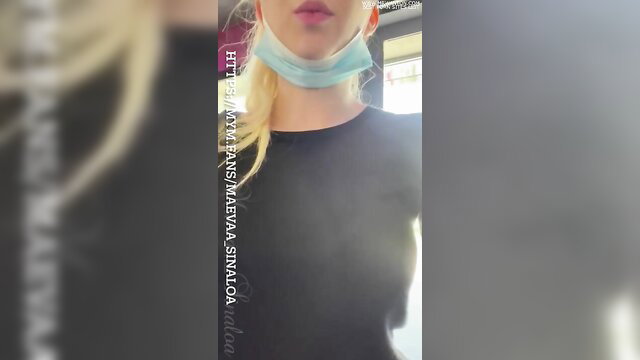 Maevaa Sinaloa blonde masked selfie in tight top and jeans
