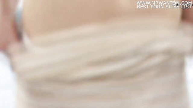 Blonde MILF next door slipping off white dress, teasing nude body