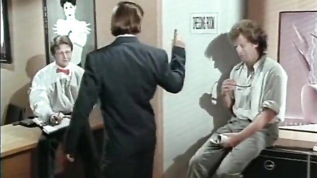 Christy Canyon in The Comeback 1995 office scene with suited men