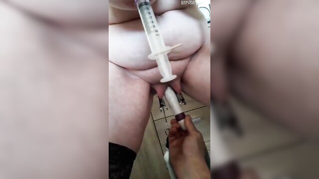 Saraloverke slave injecting syringe into pussy closeup