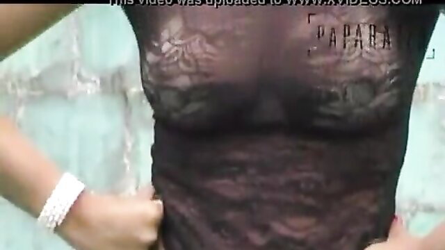 Dani Bolina in sheer lace top teasing huge tits poolside