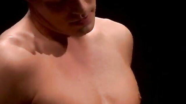 Muscular shirtless man closeup, nude torso in dim light, Best Sex Positions thumbnail