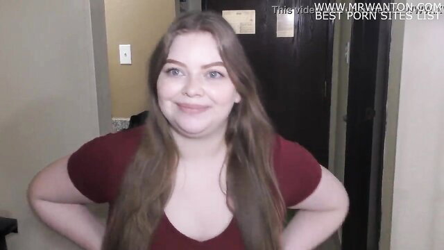 Freya Haze smiling in tight red top, curvy amateur behind-the-scenes