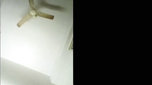 Indian bhabhi under ceiling fan in steamy bedroom tease