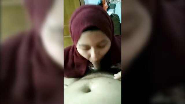Fatenn Penang Part 2: Hijab woman kissing belly in closeup amateur scene